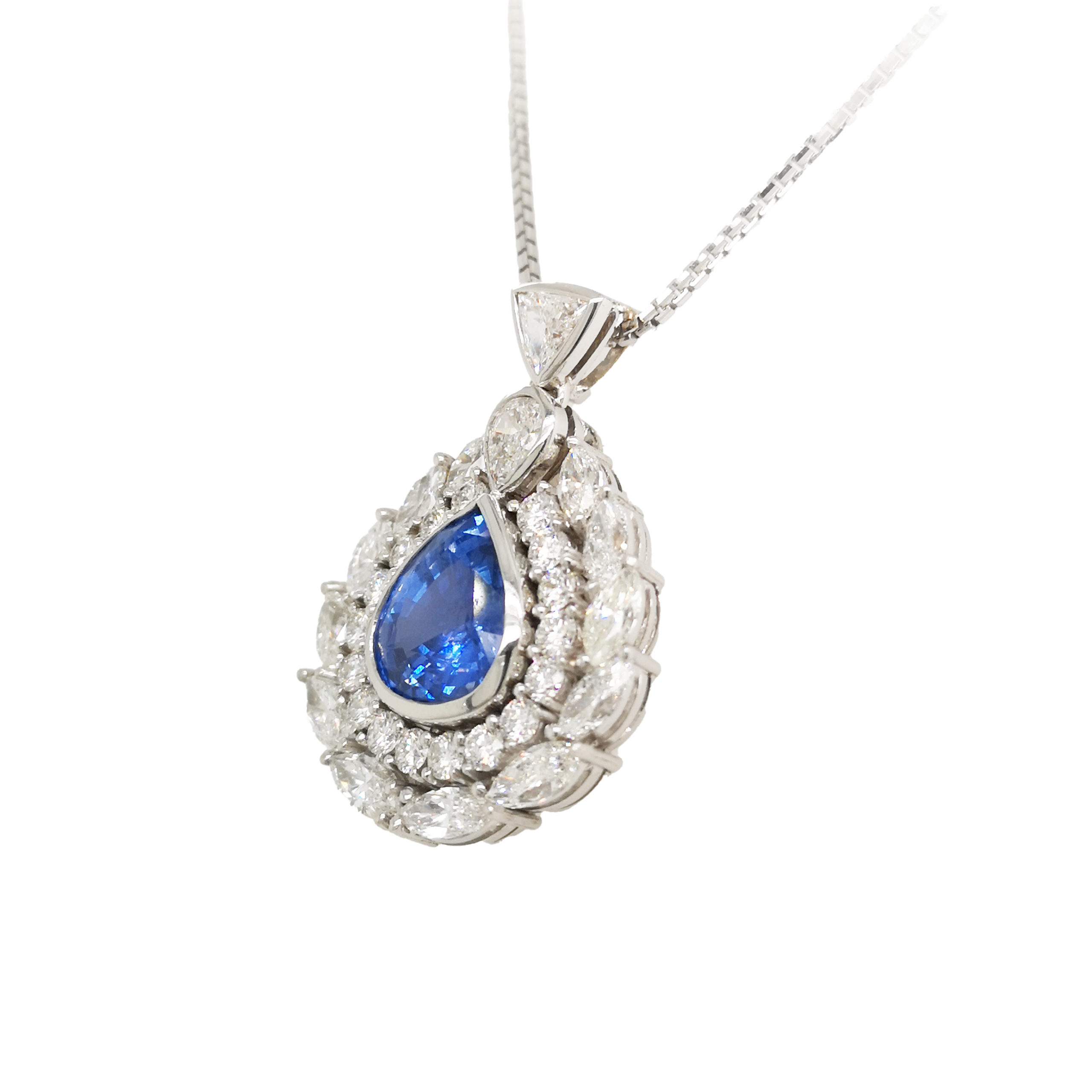 Gold necklace with sapphire on sale pendant